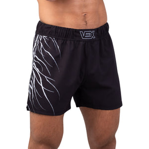 ABYSS SERIES Hybrid MMA Shorts worn by a model, side front view showing the Abyss print