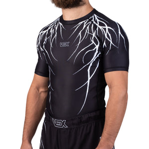 ABYSS SERIES rash guard worn by a model, angled front view